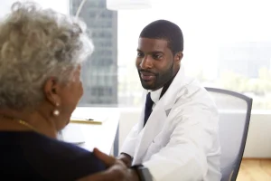 senior-woman-meeting-with-male-doctor-cosmetic-sur-2024-10-21-08-41-48-utc